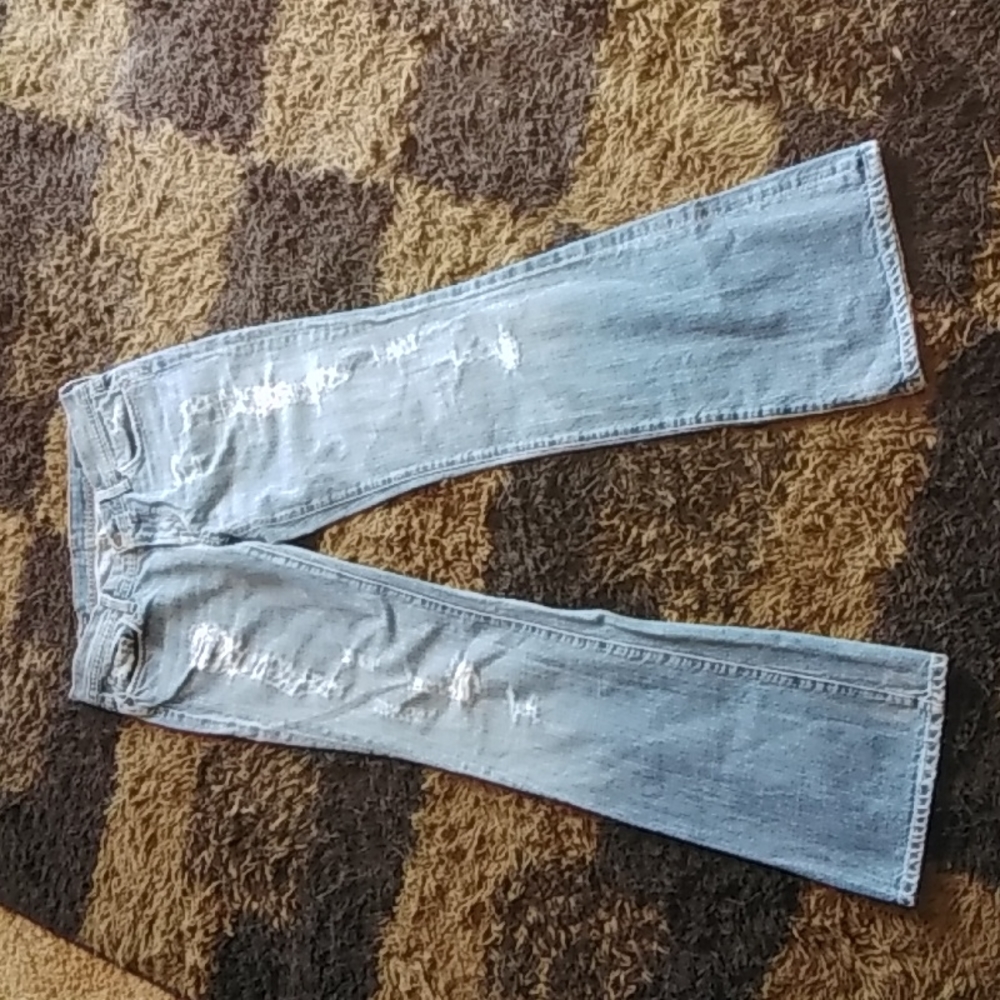 Citizens of Humanity low waist flare distressed jeans. Size 31